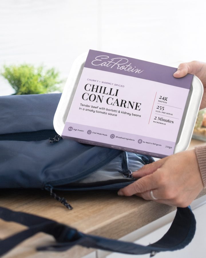Chilli con carne ready meal being packed into a gym bag